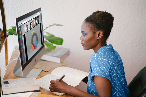 Female Student Watching Webinar